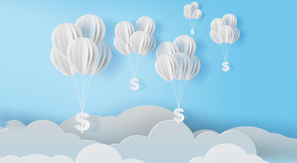 balloons with dollar signs floating above clouds