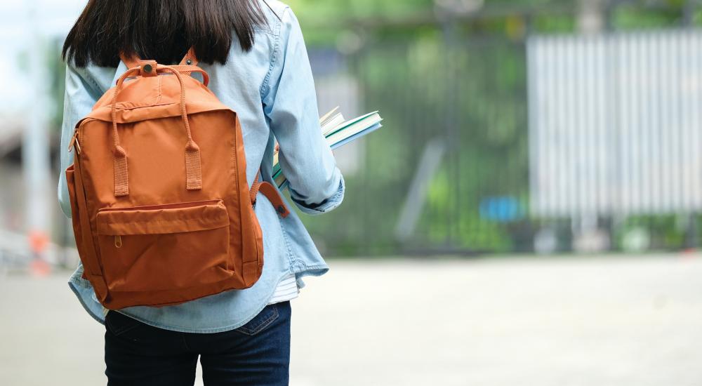 Photo of a student walking