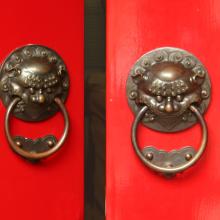 Pair of red doors slightly open